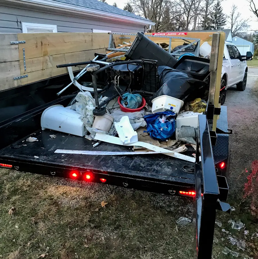 Roll-off dumpster delivered to a residential driveway in Benson