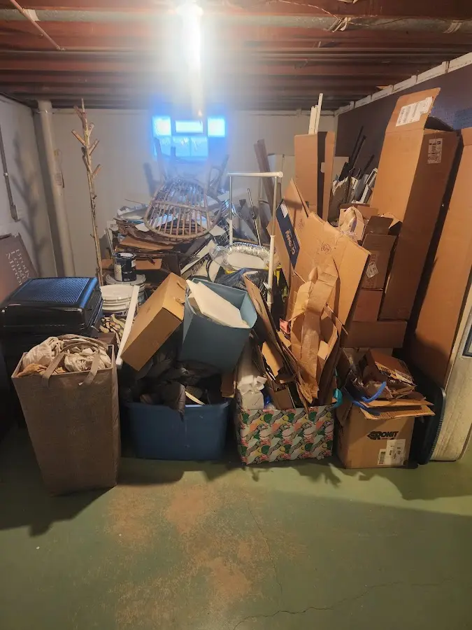 Roll-off dumpster container at job site for 8 Yard Dumpster Rental in Benson